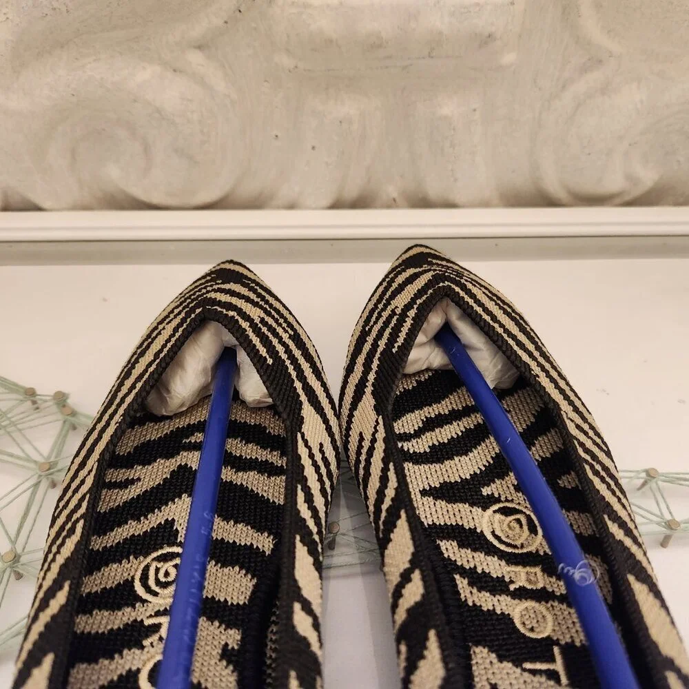 Rothy's Black/Cream Zebra Point toe flats. NWT. Size 6